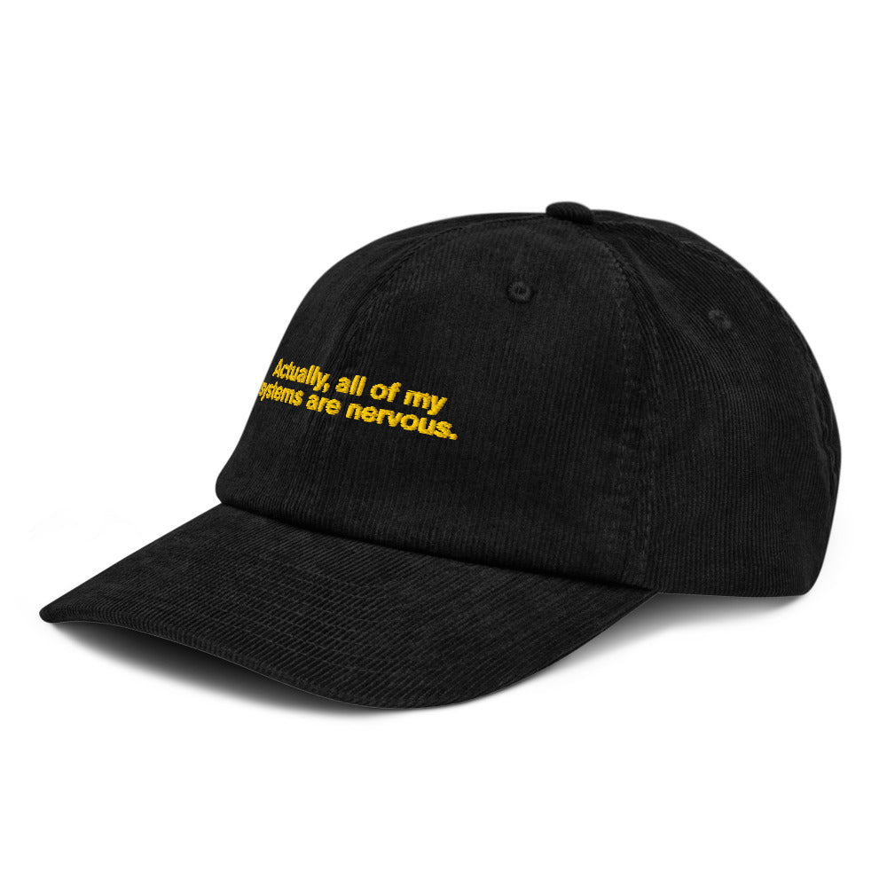 Embroidered corduroy hat on a model