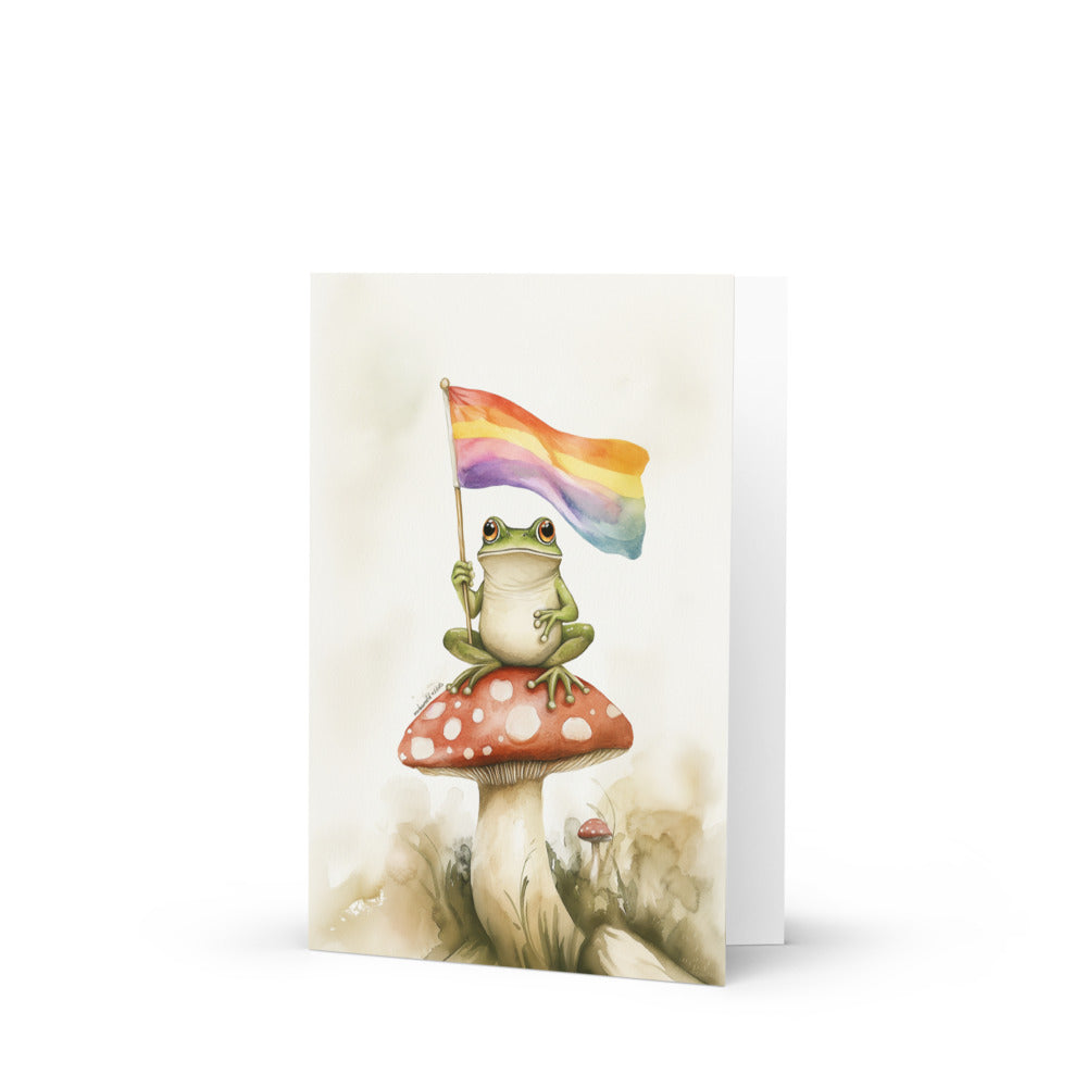 Vintage-style frog perched on a vibrant red mushroom, holding a rainbow flag, showcasing a whimsical and colorful design perfect for LGBTQ+ celebrations and Valentine's Day greetings.