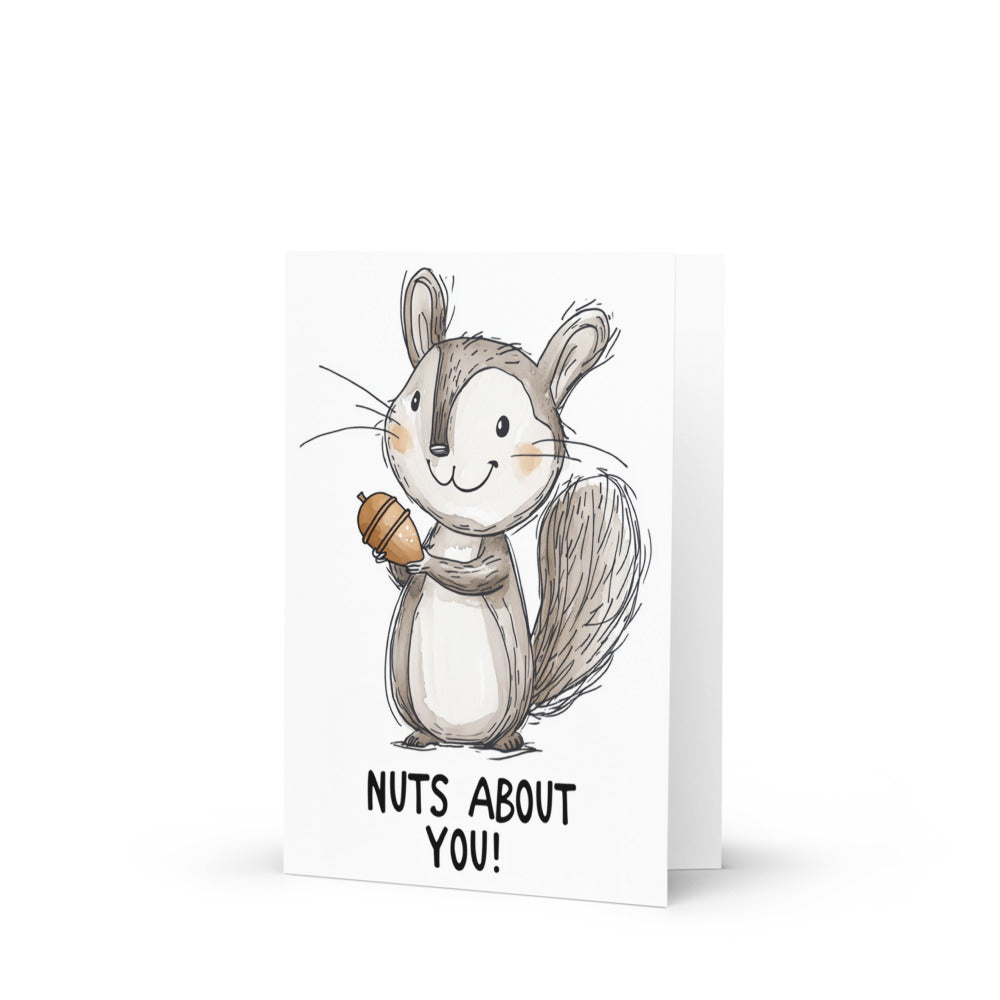 A joyful squirrel illustration holding an acorn, featured on a whimsical greeting card titled 'Nuts About You', perfect for sending heartfelt messages to loved ones and friends.