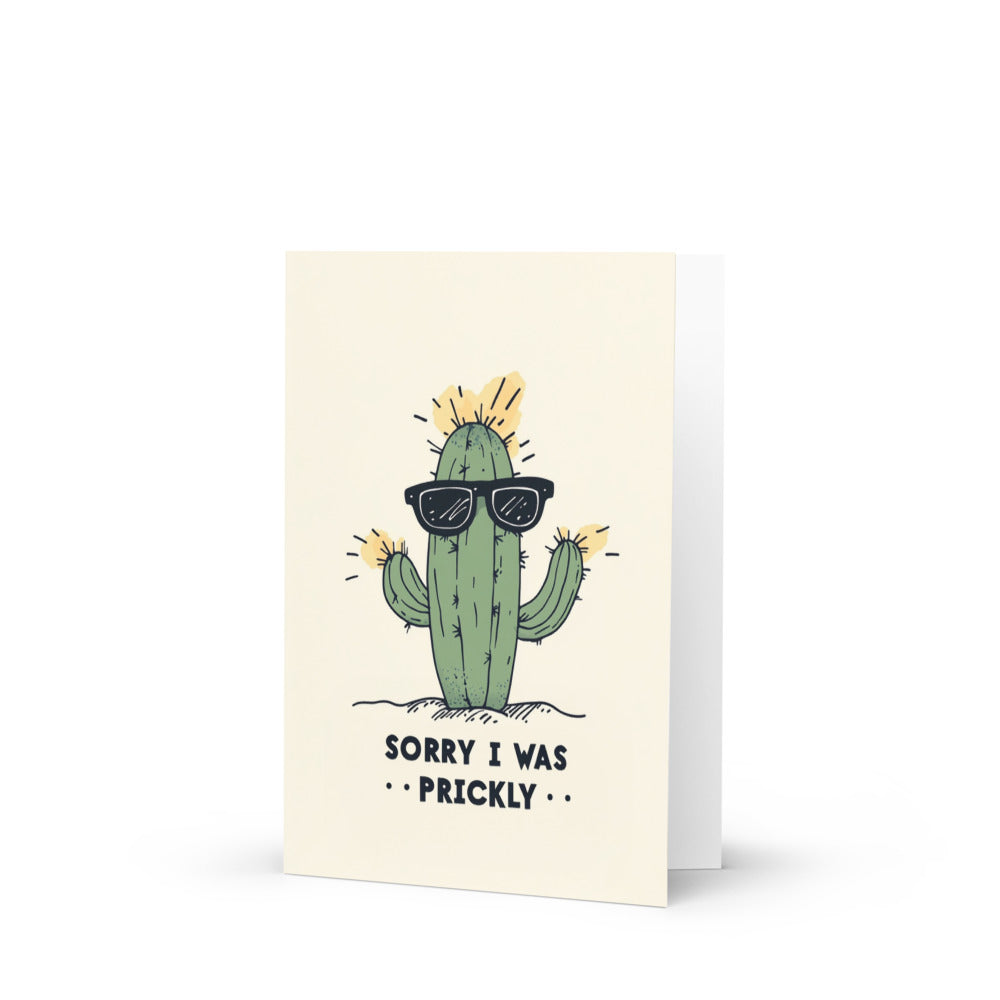 A whimsical illustration of a cheerful cactus wearing stylish sunglasses, captioned with 'SORRY I WAS PRICKLY', perfect for a humorous greeting card to brighten someone's day.