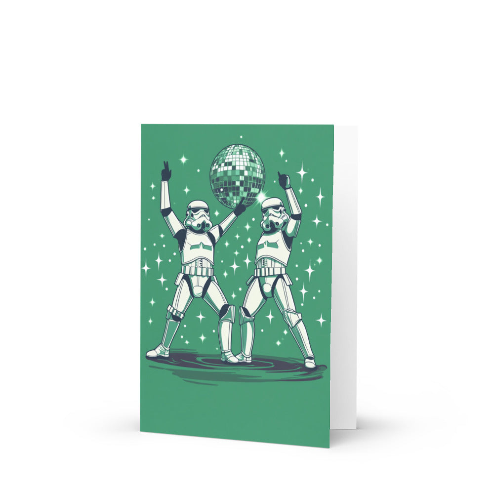 Dab-tastic Stormtrooper Greeting Card featuring two stormtroopers dancing in front of a disco ball, vibrant green background, perfect for Star Wars fans and quirky card lovers.