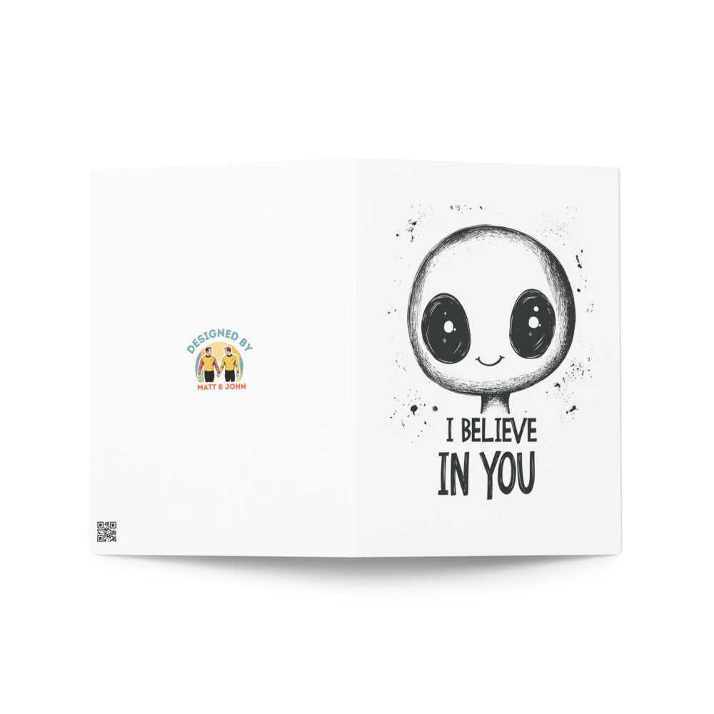 Close-up view of the Alien Greeting Card displaying the cute line-art alien and encouraging message, perfect for birthdays and new beginnings, made from eco-friendly materials.