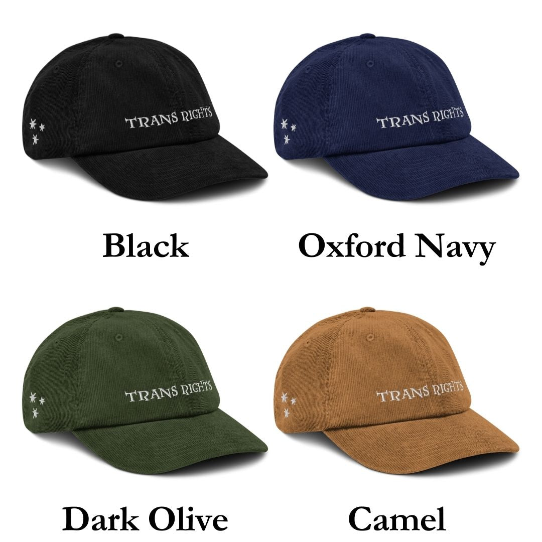 Side view of "Trans Rights" hat, featuring embroidered lettering on soft black corduroy fabric.