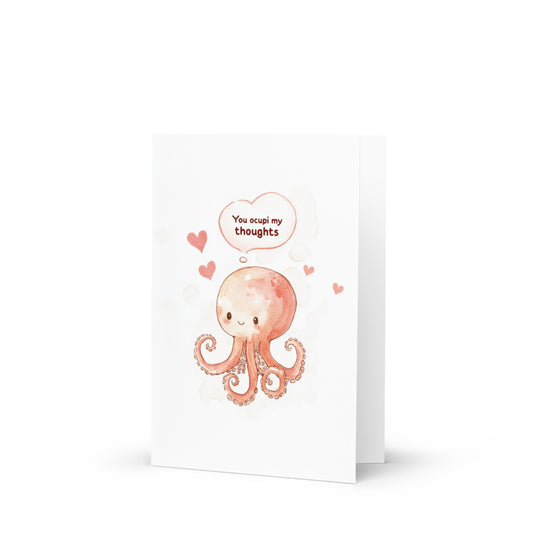 Cute watercolor illustration of an octopus with a thought bubble saying 'You Ocupi my thoughts' on a minimalist white background, perfect for Valentine's Day or any affectionate occasion.