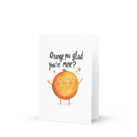 Charming greeting card featuring a cute kawaii orange character with the text 'Orange you glad you're mine?' illustrated in soft pastel watercolor style, perfect for expressing affection and joy.