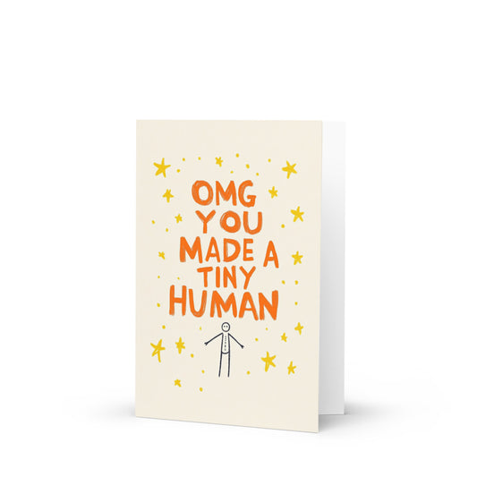 Whimsical baby congrats card featuring 'OMG YOU MADE A TINY HUMAN' in bold orange text, soft cream background, and playful yellow stars, perfect for celebrating new arrivals and parenthood milestones.
