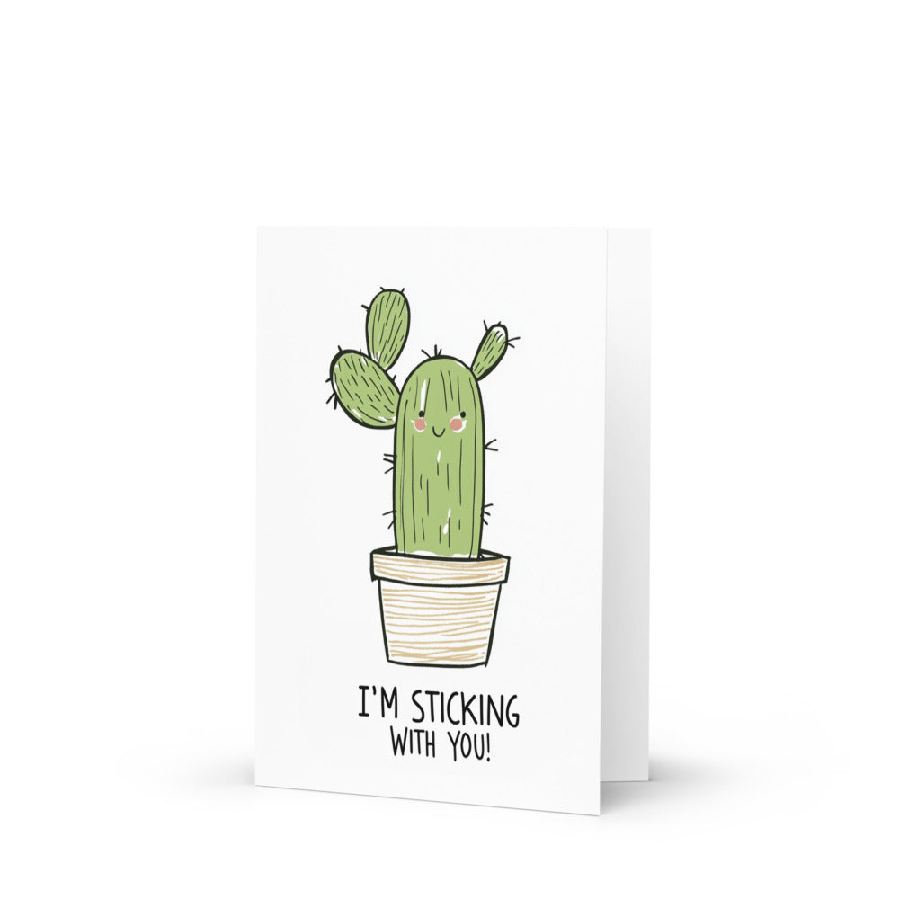 Minimalist cactus encouragement greeting card featuring a hand-drawn green cactus in a pot with the phrase 'I'M STICKING WITH YOU!' on a clean white background, perfect for uplifting spirits.