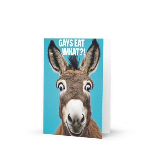 A vibrant greeting card featuring a cartoon donkey with big eyes and white hooves, against a bright blue background with the text 'GAYS EAT WHAT?!' showcasing LGBTQ+ humor, perfect for birthdays or celebrations.
