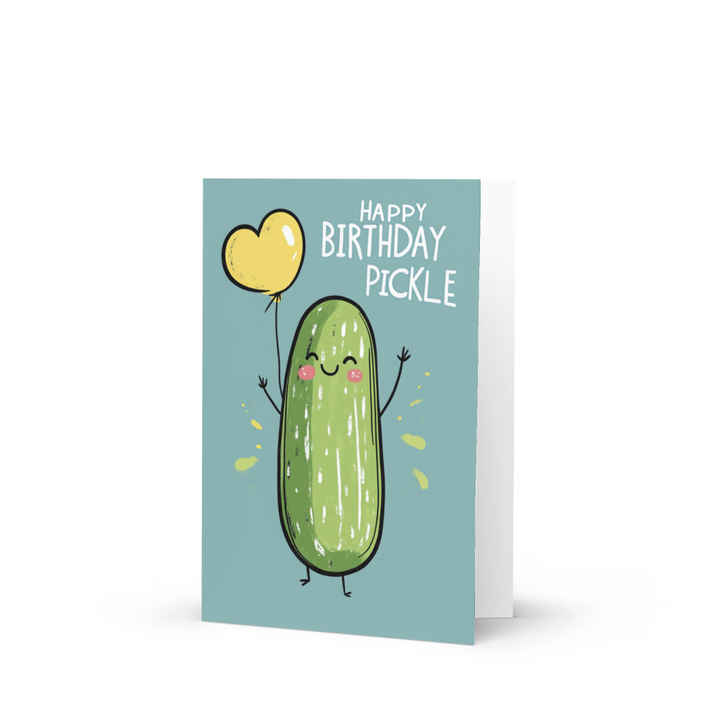 Happy Birthday Pickle greeting card featuring a cute pickle holding a yellow heart-shaped balloon on a light blue background, perfect for birthday celebrations and pickle lovers.
