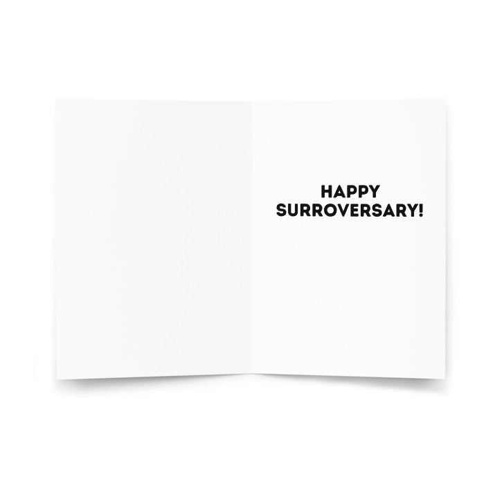 Inside view of the Happy Surroversary greeting card showcasing bold text saying 'HAPPY SURROVERSARY!' against a blank background for personalized messages.