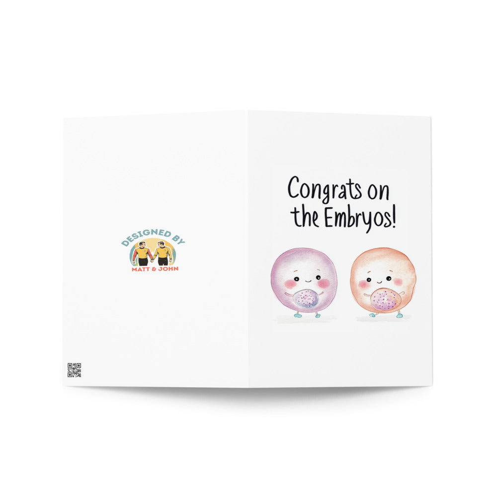 Front design of a humorous greeting card featuring playful text, 'Congrats on the Embryos!', with cheerful embryo illustrations, ideal for fertility treatment milestones.