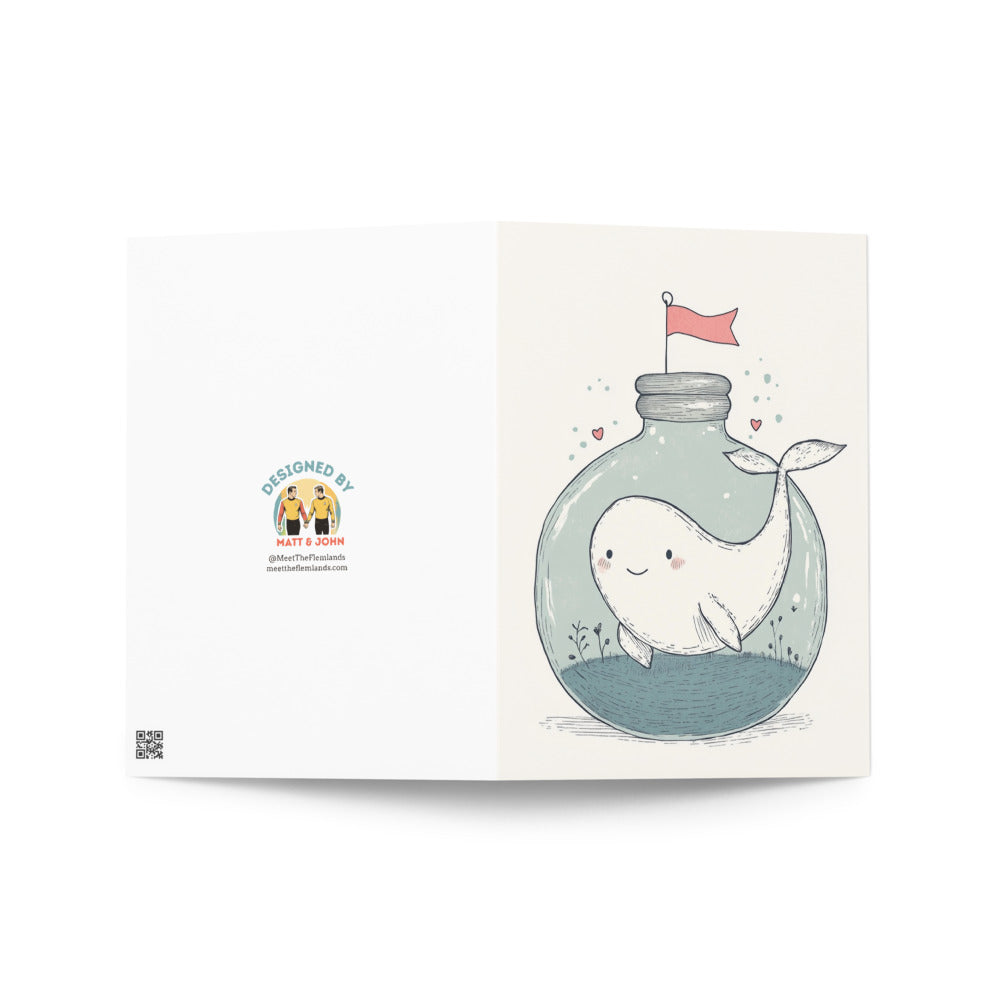 Adorable whale-themed greeting card showcasing a light bulb topped with a tiny flag, perfect for birthdays, anniversaries, or just-because moments.