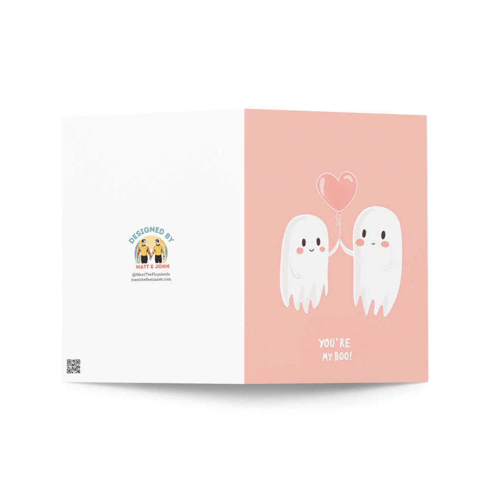 Cute kawaii ghost couple floating together, one holding a heart balloon, this unique greeting card is perfect for celebrations of love and friendship, suitable for various occasions.